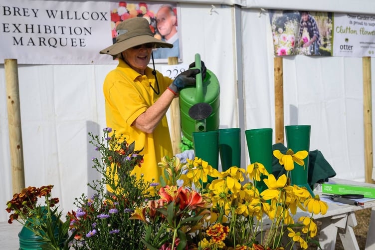Volunteers helping to get the exhibits and show ready for the more than 1,600 visitors who attended.