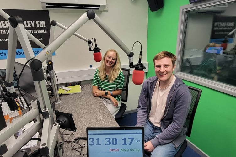 Somer Valley FM presenter Jamie Skinnner and interview partner Meg Abernethy-Hope breaking a world record.
