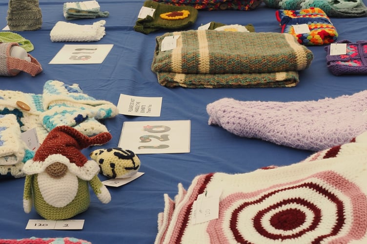 A table of handcrafted items ready for judging in the marquee at the 137th Writhlington Flower Show.