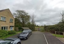 Council hit with legal bill over new homes in village